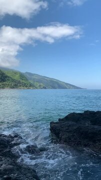 The roar of the waves on a calm beach is suitable for calming the mind. Location on Bita beach, East Nusa Tenggara, Indonesia