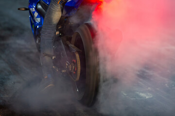 Motorbike burning tire rubber with white smoke for race, Motorbike burning tire rubber, Motorbike...
