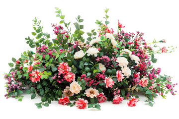  Lush floral arrangement with a mix of pink roses and various green leaves isolated on a white background.