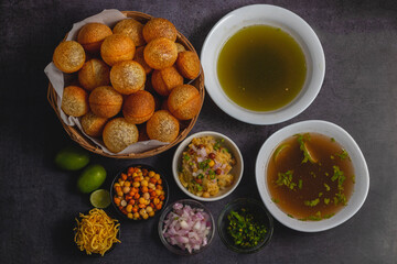 Exploring the Tangy, Spicy, and Refreshing Delight of Pani Puri. India's Favourite Street Food Experience. Selective focus. 