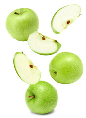 flying green apples with slices isolated on a white background. clipping path