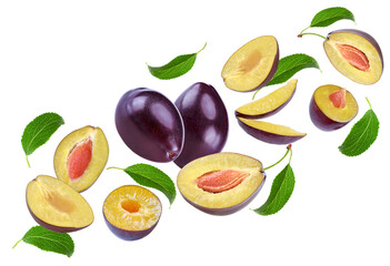 flying fresh plum fruit with green leaf and cut plum slices isolated on white background. clipping path