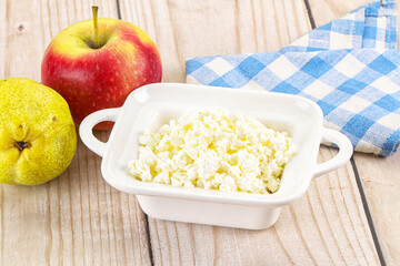 Organic cottage cheese in the bowl