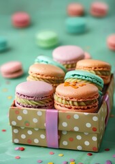 Fototapeta premium Colorful french macaroons in gift box on color background. Top view of various assorted flavors of classic French macarons in a gift box,almond cookies,Valentine's day sweet gift,holiday,celebration.