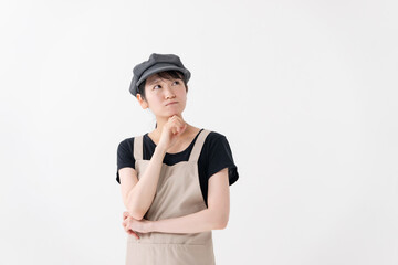 悩む飲食業の女性