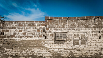 abandoned building with rustic brick wall in the old town