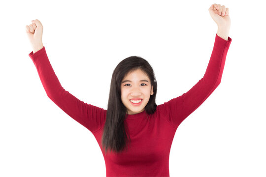 young asian girl raises her hands to express happiness