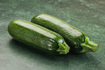 Raw green ripe zucchini vegetable