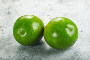 Two ripe green exotic avocado fruit