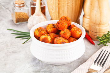 Baked young potato with paprika