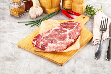 Raw pork neck steak for grill