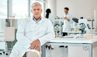 Obraz premium Scientist, portrait and mature man in laboratory for innovation, research or investigation. Solution, pathology and technician with confidence for discovery, breakthrough or medical experiment