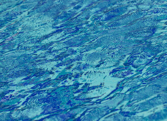 small waves on blue water as a background.