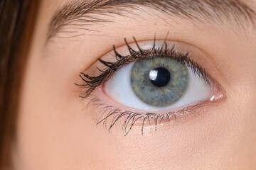 Obraz premium Little girl with green eyes, closeup