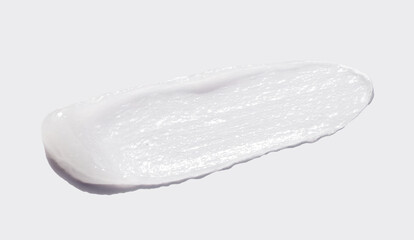 sample smear of cosmetic peeling gel on a light gray background close-up