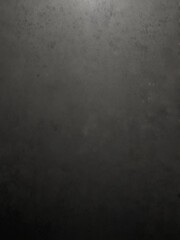 Obraz premium A textured gradient background blending gray and black with a grainy finish, suitable for minimalist and modern designs.