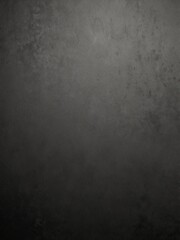 A textured gradient background blending gray and black with a grainy finish, suitable for minimalist and modern designs.