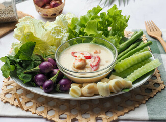 Thai style shrimp simmered in coconut milk with chili and fresh vegetables - Thai food called Lon Kung or Lhon kung at close up view