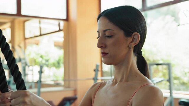 Woman Training Triceps And Focusing On Breathing 