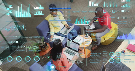 Image of financial data processing over diverse business people in office