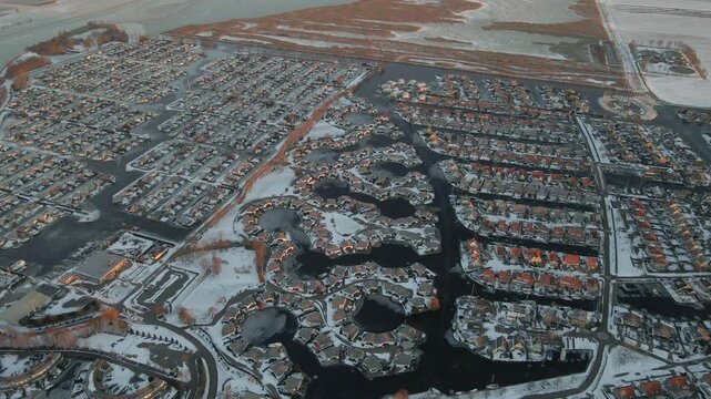 Aerial view of snow-covered village and houses in Lemmer, Friesland, Netherlands.