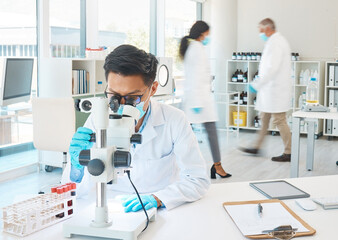 Microscope, vials and man scientist in laboratory with blur motion for dna, blood test or rna...