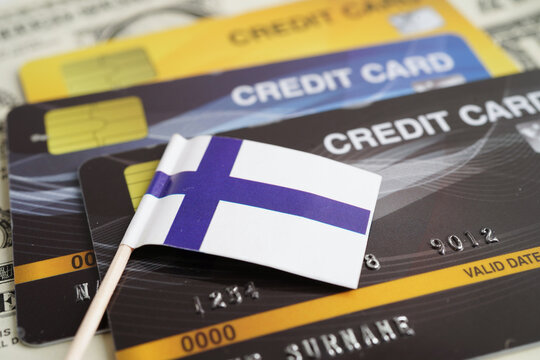 Finland flag on credit card, finance economy trading shopping online business. - Powered by Adobe