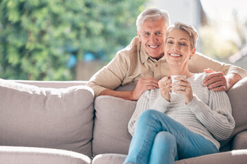 Mature, couple and coffee with portrait on sofa in morning, happiness and hug or lounge with love for marriage. Senior, man and woman with warm beverage in family house, bonding and relationship.