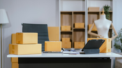 workspace area with laptop tablet smartphone and paperwork on the table in the office concept.