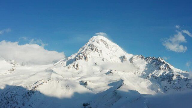 A high flight over Mount Kazbek - volcano in Georgia