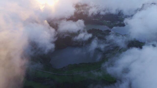 Aerial view of serene lagoon and picturesque valley at sunset, Sete Cidades, Azores, Portugal.