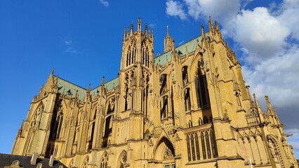 Fototapeta premium Cathedral of saint stephen, Metz, Lorraine, Moselle, France. Blue sky white clouds.