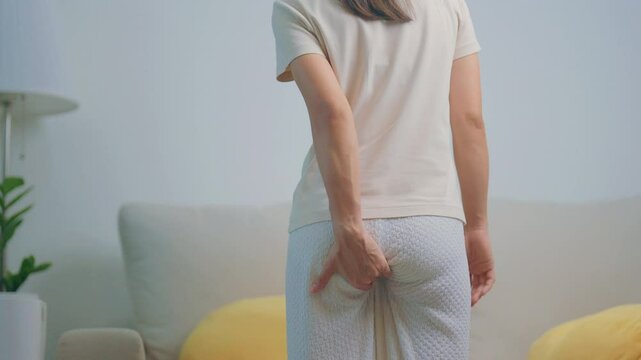 Woman having Abdominal pain. Hemorrhoids disease Constipation, Colorectal cancer. Digestive system, Health care and medical concept