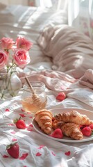 Romantic breakfast in bed, fragrant roses, fresh croissants and honey on white sheets