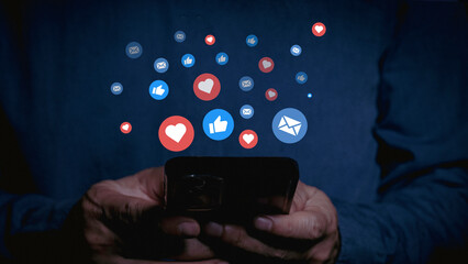 Social media and online digital concept Man using smartphone on social media Ideas for spending time on holiday and using social media online marketing technology network concept