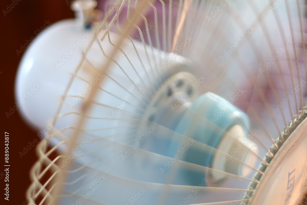 Aufkleber a detailed view of a fan with a clock face on the front, great for showcasing time or retro design.