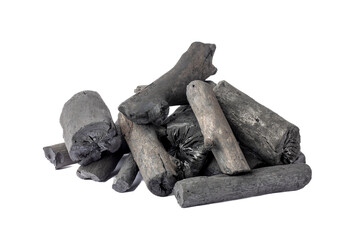 A close-up image featuring a pile of charcoal logs arranged haphazardly against a white background,...