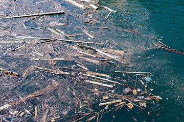 Plastic debris in the water. Environmental and ocean pollution. Ecological problem.