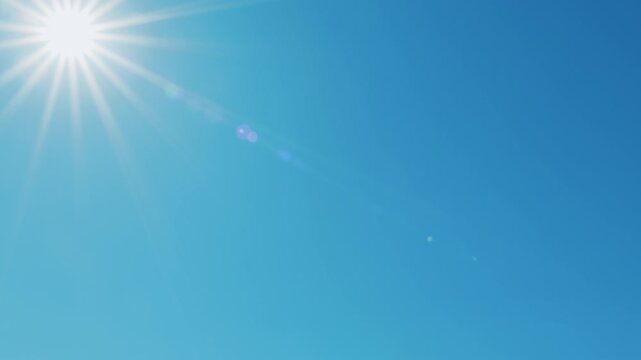 Sun Shining Bright In Clear Blue Sky. Solar Energy Power Concept Of Natural Bright Sun Light Ray. Tropical Summer Sunlight. Atmosphere And Ozone Layer.