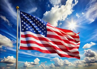 Obraz premium Vibrant stars and stripes of the American flag waving gently in the breeze against a bright blue sky with soft white clouds.