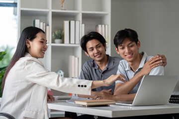 Happy Gay Couple Planning Finances with Financial Advisor at Home Office, Discussing Budget and Investments