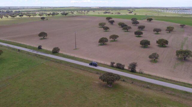 Aerial view of rural landscape with road, camper, and fields, Odivelas, Beja, Portugal.