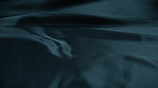 Close up of black silk background