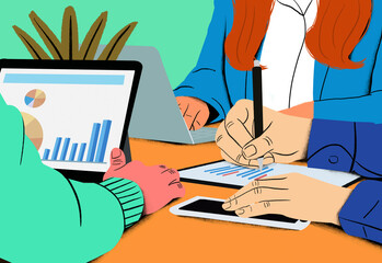 Two professionals working on a financial analysis with charts on a laptop and tablet.