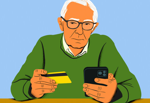Elderly man with glasses holding a credit card and a smartphone, appearing focused and thoughtful.