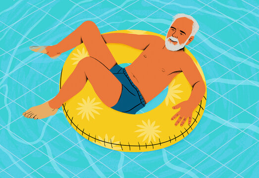 An elder man with a white beard enjoys floating on a yellow inner tube in a pool, with a relaxed pose and a happy expression.