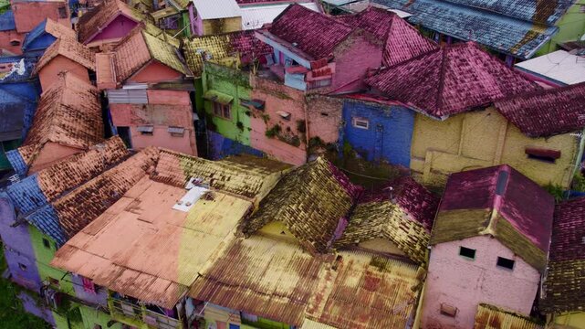 Aerial view of colourful Kampung Jodipan with rainbow painted houses, Malang City, East Java, Indonesia.
