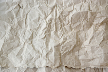 Fototapeta premium Brown background of paper texture or cardboard surface from a paper box There are wrinkles from the impact. Surface of the parcel box is wrinkled with Transport
