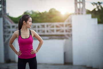 Young Asian Girl doing exercise in park