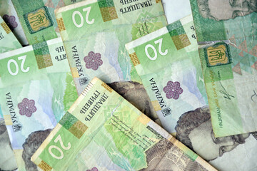 Processed collage of Ukrainian Hryvnia UAH bills banknotes texture. Background for banner